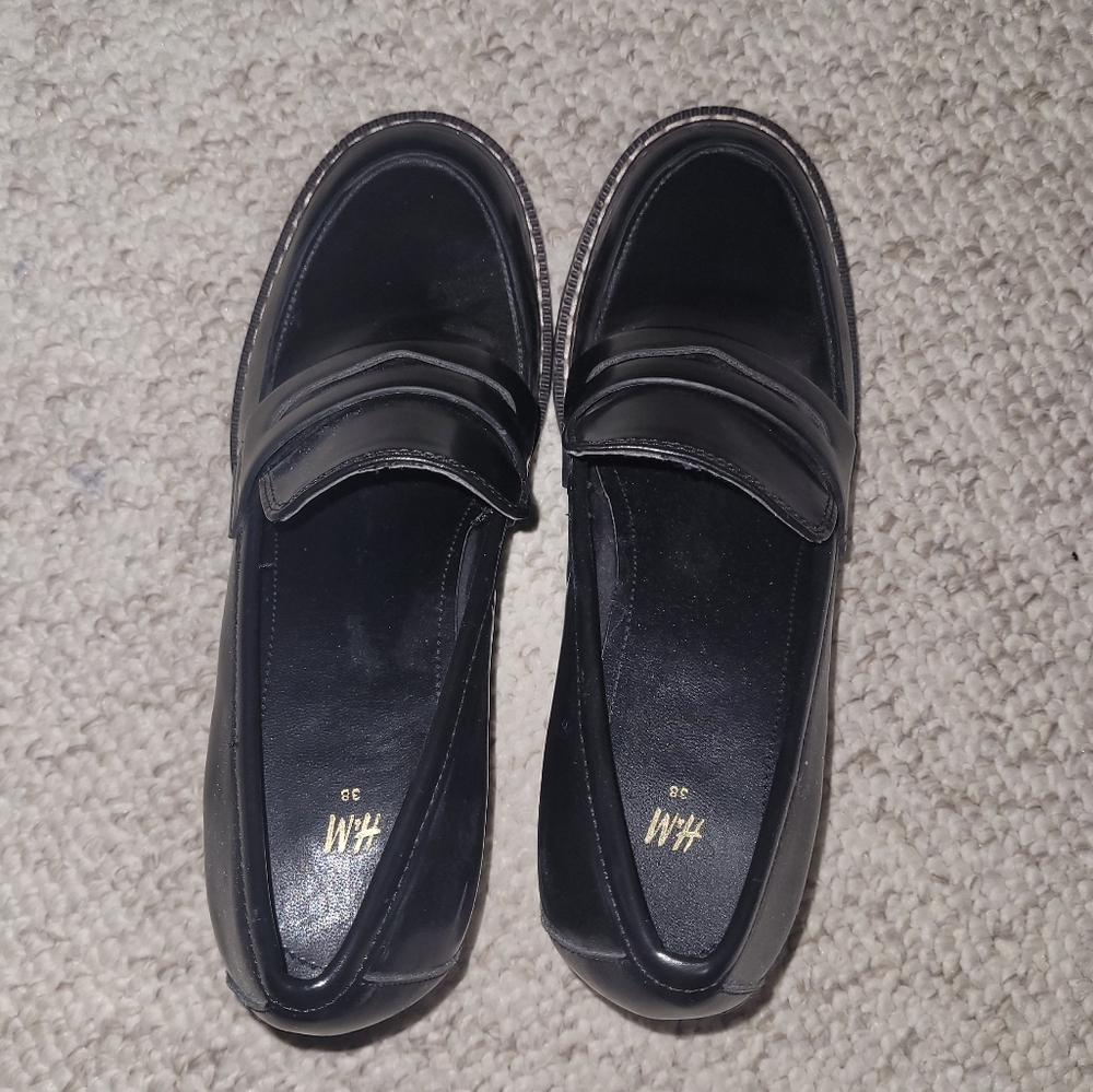 Black leather loafers